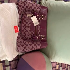 New with tags Purple Coach Purse .....$250